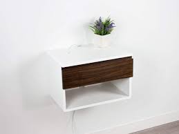 The nightstand in this bedroom uses modern wooden materials, it is placed in the most conventional way matching the height of the if you're seeking a darker wooden design when it comes to floating shelf nightstands, the on picture here is sure to inspire. Amazon Com Blanca Walnut Floating Nightstand Drawer With Open Shelf Wall Mount Bedside Table Shelf Floating Shelf With Drawer Handmade