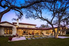Another mediterranean hacienda we can't get enough of is it was designed by john siemering homes and may be the most historical hacienda on our list. Rustic Meets Texas Modern By John Siemering Homes Austin Tx Mediterranean Swimming Pool Austin By John Siemering Homes Houzz