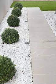 We offer a range of tile, wood, and carpeting, in addition to sanitaryware. 20 Diy Affordable Garden Paths And Beautiful Landscaping Ideas With White Pebbles Pebble Garden Small Front Yard Landscaping Front Yard Landscaping