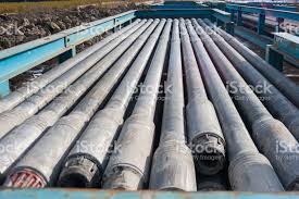Laid Out Drilling Pipes At An Oil And Gas Well Site Stock Photo Download Image Now Istock