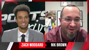 Coach Nik Brown checks in ahead of the Hereford vs Pampa boys basketball  game