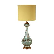 This beautiful porcelain and brass stiffel lamp is in excellent condition. Large Table Lamp In Blue Porcelain In The Shape Of A Hand Painted Vase With Floral Patterns And Aged Brass