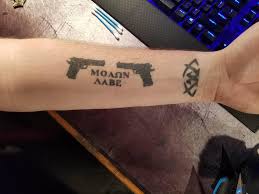 A black eagle is a large bird of prey and is also known for its aggression. Molon Labe Tattoo Arm 2048x1536 Wallpaper Teahub Io