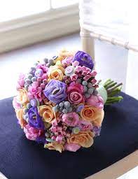 See more ideas about wedding bouquets, wedding, bridal bouquet. Pretty Mixed Flower Wedding Bouquet In Bright Colours And Accessorised With Buttons Simple Wedding Bouquets Classic Wedding Bouquet Flower Bouquet Wedding