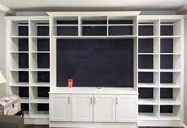 So, for example, you can hide all your stuff in the back corner of an overcrowded closet (functional) or you can tuck it away in a pretty, new diy wardrobe armoire cabinet like this (obviously this is the functional and pretty option 😉 ). Custom Built In Entertainment Media Center Closet America