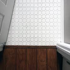 Tile and laminate are both residential flooring options that tend to lay on top of an underlayment, and the ceramic tile may be a bit higher than laminate. Top 70 Best Tile To Wood Floor Transition Ideas Flooring Designs