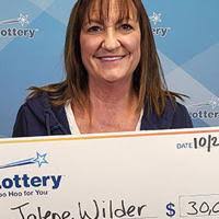 Waterloo woman wins $30,000 in new holiday scratch game