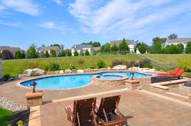 The average cost to install an inground pool is $35,000 with most homeowners spending between $28,000 and $55,000.the additional cost of pool ownership for basic maintenance, increased utilities, and repairs add $2,500 to $5,000 every year. Beautiful Mountain Lake Style In Ground Pool With Raised Spa Contemporary Pool Philadelphia By Monogram Custom Pools 610 282 0235 Houzz