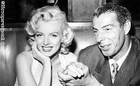 Marilyn Monroe and a red rose .