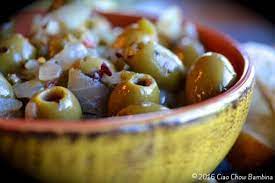 Spicy Olives Recipe Yummly Recipe Olive Recipes Stuffed Peppers Tea Time Snacks