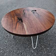 Round Black Walnut Coffee Table Sitting On Hand Bent Vintage Inspired Hair Pin Legs Coffee Table Walnut Coffee Table Table