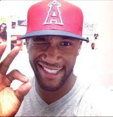 Can re-submitting a graded sports card improve its grade?