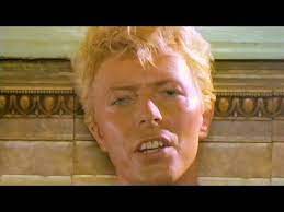 David was fascinated by australian culture, which featured heavily in his music, particularly in his film clip for hit song let's dance, released in 1983. David Bowie Let S Dance Youtube