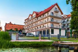 14,81 km²ko azalera du eta 2017ko datuen arabera 21926 biztanle zituen. Hotel Huszcza Hotel Mragowo Poland Overview