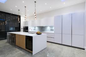 white bespoke kitchen filled with light