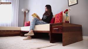 This living room furniture style offers versatile modular design, a plus if you enjoy rearranging your decor. L Shaped Sofa Buy Cortez L Shaped Wooden Sofa In Teak Finish From Wooden Street Youtube