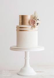 Blush Rose Gold Wedding Cake Trio White And Gold Wedding Cake Gold Wedding Cake Rose Gold Wedding Cakes