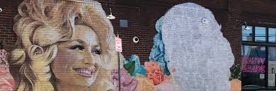 Who's joining Dolly in West Asheville mural?