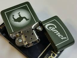 While they are cool, they belong in the /r/lighters subreddit. Camel Zippo Lighter Z211 Camel Haloed Beast 1996 Rare Green Case Jack Rabbit S Vintage