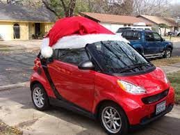 A Very Smart Santa Hat Occasions And Holidays Christmas Car Decorations Smart Car Christmas Parade Floats