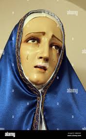 Woman mourning figurine hi-res stock photography and images