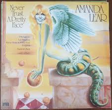 Although amanda lear actually sings the lyrics like they are shown here, they partly don't make much sense and partly are grammatically incorrect. Amanda Lear Never Trust A Pretty Face Recordmad New Used Vinyl Records