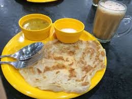 While it's served throughout the day, it's most commonly eaten as a breakfast item along with a milk tea known as teh tarik. Roti