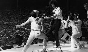 Queen are a british rock band formed in london in 1970. Queen S Live Aid Performance How Rock S Royalty Stole The Show