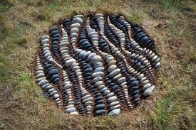 Environmental art is a range of artistic practices encompassing both historical approaches to nature in art and more recent ecological and politically motivated types of works. Land Art Colossal