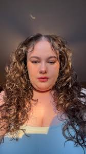 Hi need your help please, could someone make me look a little slimmer and  get rid of my double chin, I love this picture but the way it was taken I  look