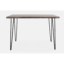 The table has a round solid wood tabletop in a gray finish with visible wood grain. Cast Iron Dining Table Wayfair
