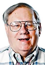 Truman grad takes over Belton football