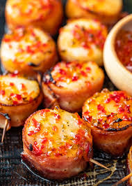 Maybe you would like to learn more about one of these? Scallops Wrapped In Bacon And Topped With Hot Pepper Jelly Scallop Recipes Baked Scallops Bacon Wrapped Scallops Recipe