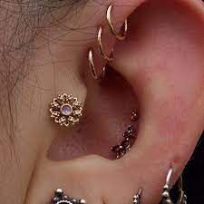 Moonstone Rosettes Are What Dreams Are Made Of Jewelry By Bvla Piercing By Perrymdoig Ootd Girlswithpiercin Earings Piercings Ear Jewelry Cute Piercings