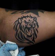 Small tribals tribal hope tattoo. 30 Tribal Lion Tattoo Designs Meanings