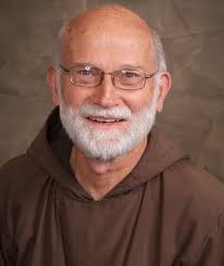 Spotlights Father Bill