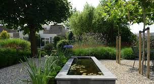achtertuin met hoogteverschil en spiegelvijver hovenieren achtertuin tuin