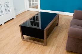Toughened glass top & deep black finish. Surface Tension Nucleus Arcade Coffee Table