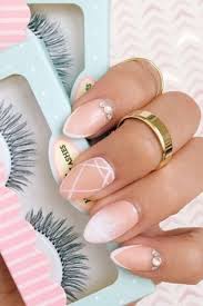 Light pink almond nails with silver applications. 25 Photos To Show You How Sexy The Almond Nail Shape Looks
