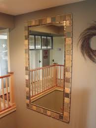 Brilliant Gonna Hot Glue Tile Around Our Plain Bathroom Mirrors In Our Rental Take With When We Re Done Cu Tile Mirror Frame Mirror Frame Diy Mirror Tiles