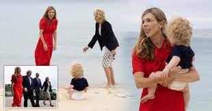 The $2,000 frock looked awfully similar to a red chiffon lk bennett style carrie johnson had worn for their meeting the day prior. Carrie Johnson And Son Wilfred Pictured Playing On Beach With Jill Biden Metro News
