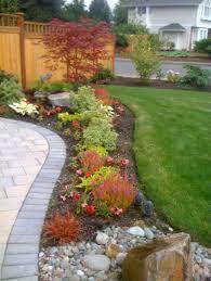 Front Yard Landscape Design For Corner House The Garden Of Her Dreams An Olympia Garden Corner Landscaping Front Yard Landscaping Design Front Yard Landscaping