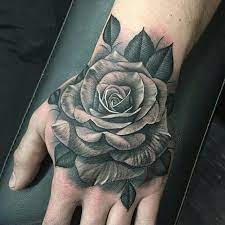 3 832 Likes 16 Comments Tattoo Media Ink Skinart Mag On Instagram Tattoo Work By Justinburnouttat Hand Tattoos For Guys Hand Tattoos Rose Hand Tattoo