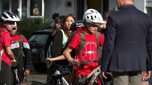 Community rallies for boy killed while riding bike to school 1 year ago
