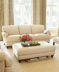 Here, a brown leather pouf sits across from the brown sofa to tie the look together. Cream Leather Furniture Beige Leather Sofa Decorating Ideas Novocom Top