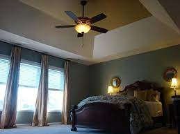 Tray ceiling with coffered design. Example Of Sloped Tray Ceiling Ceiling Design Bedroom Tray Ceiling Tray Ceiling Bedroom