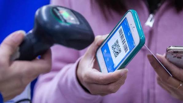Du khách đến Trung Quốc đã có thể thanh toán bằng WeChat Pay và Alipay,  không cần dùng tiền mặt như dân địa phương