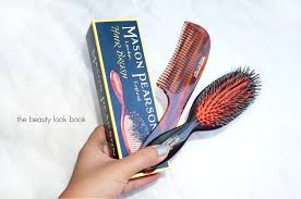 I use the junior mixture model, which features a mixture of nylon and natural boar bristles—it glides through my hair easily and comfortably. Mason Pearson The Beauty Look Book