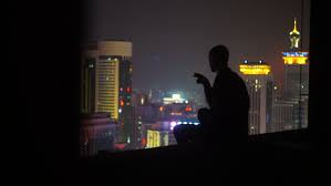 Top of building at night. A Man On Top Of Stock Footage Video 100 Royalty Free 27989872 Shutterstock
