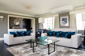 Using pops of red and blue upon black and grey, this modern eclectic living room is coloured under baubles. Wenge Color Modern Interior Design Ideas Small Design Ideas